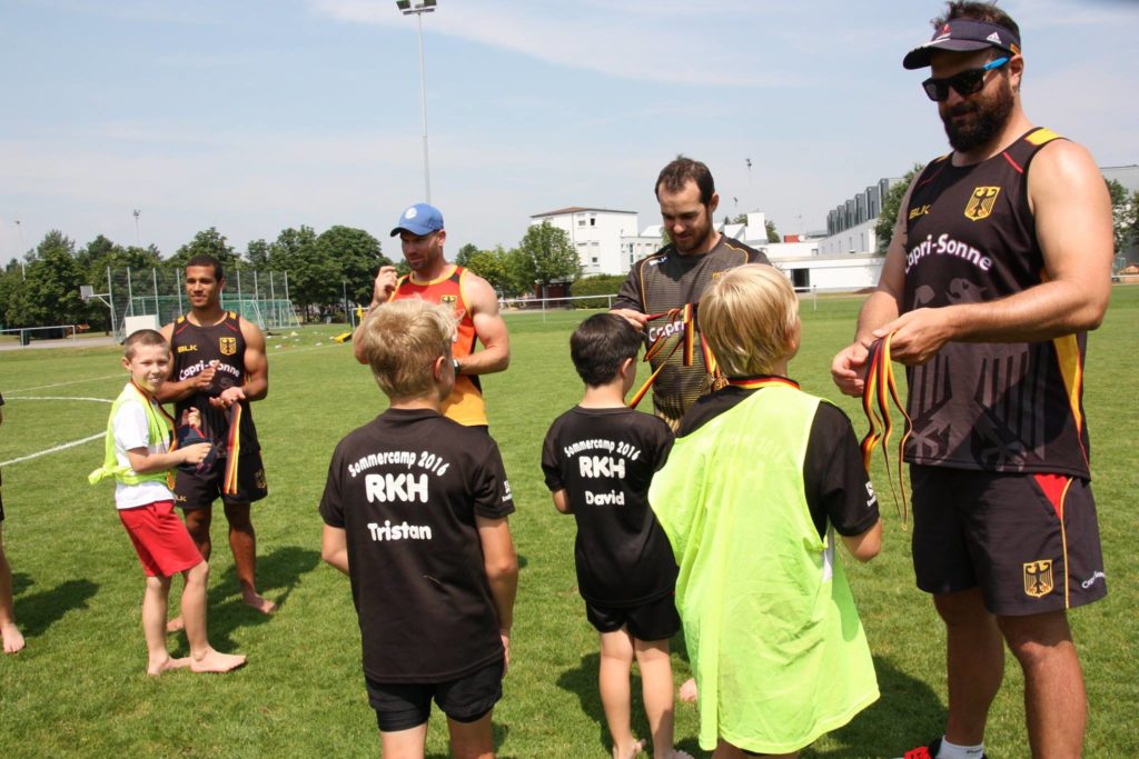 Die WRA Trainer Mathurin, Jordaan, Armstrong und Poppmeier beim RKH Sommercamp (C) RK Heusenstamm